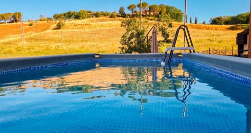 San Giovanni d'Asso Apartment | VAL D'ORCIA DELUXE 2, RAFFINATA CASA immersa nel verde con WiFi, giardino e parcheggio