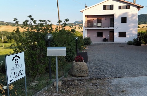 Frontone Apartment | Viti Attic - A glimpse of Frontone Castle