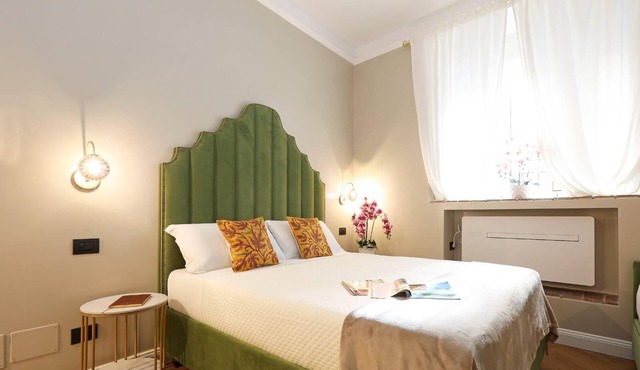 An elegant and refined loft in the heart of Rome just steps from the Vatican where history and comfort blend in an exclusive atmosphere