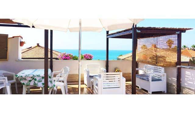 apartment in a villa by the sea with stunning views