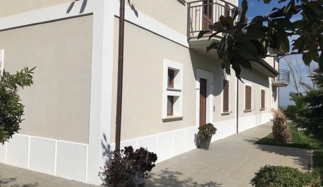 Apartments in villa with garden