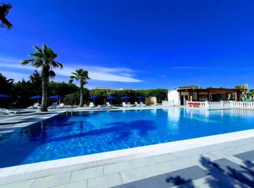 APPARTAMENTO AL MARE CON PISCINA