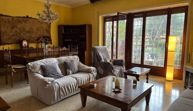 Bright apartment overlooking a characteristic square