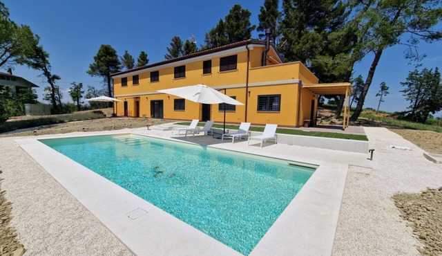 Elegant new house with garden, veranda and shared pool