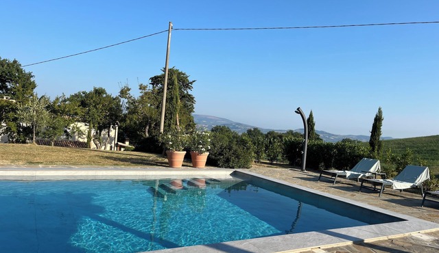 Family holiday home with great view, heated pool and pizza oven