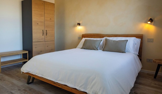 Guest House's Room - relaxing by the pool amid silence and nature.