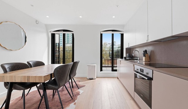 Modern 1-Bedroom Apartment with Balcony Views