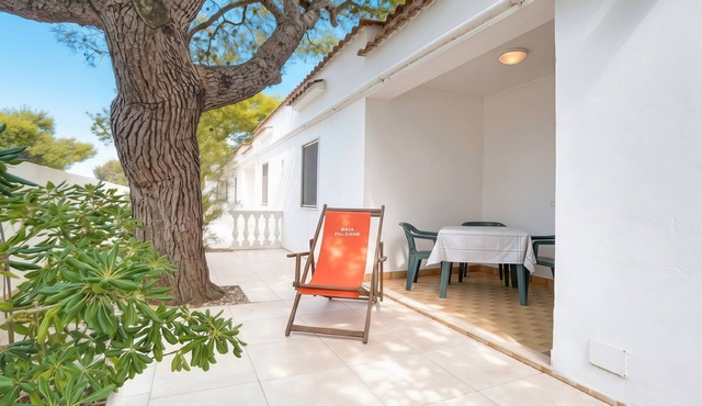 Property in a holiday village 'Baia Falcone-Bilocale 407' with sea view and air conditioning