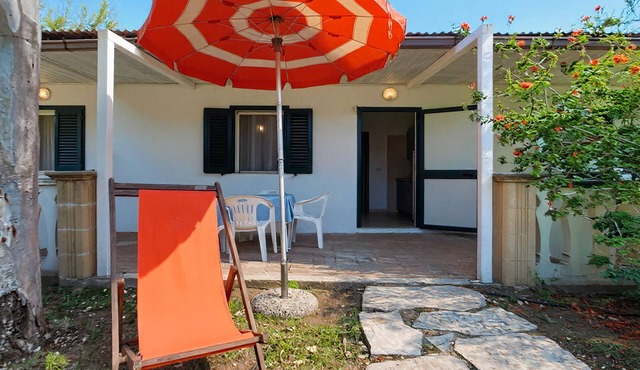 Property in a Holiday Village 'Baia Falcone - Comfort 210' with Sea View and Air Conditioning