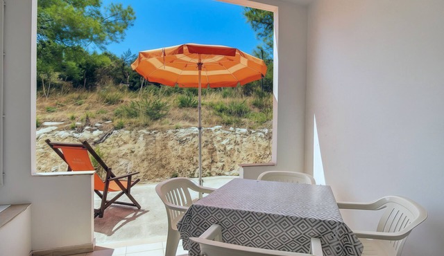 Property in the holiday village 'Baia Falcone - Standard 204' with sea view and air conditioning