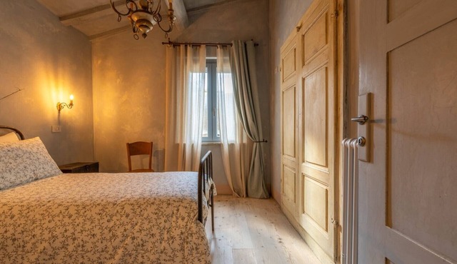 Room 'L'imbrunire - L'opificio' with Shared Garden, Wi-Fi and Air Conditioning