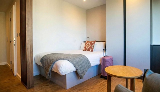 Roomy Studio Suite | Laundry room | StayCozy