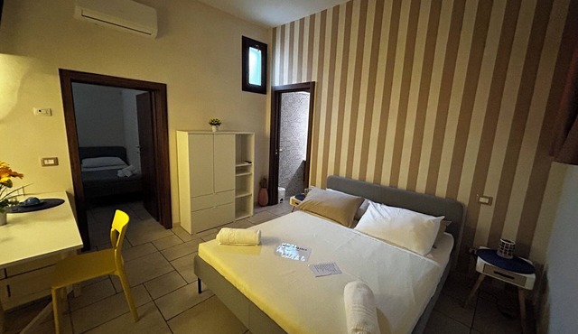 Standard Room for 1-4 Guests – Comfortable Stay in Pulsano Historic Center