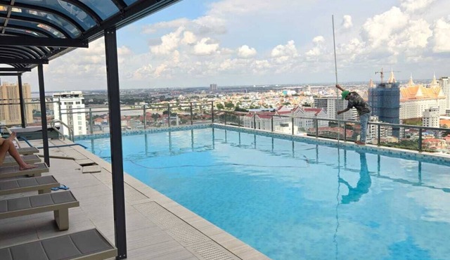 Stylish penthouse condo with pool, gym and more.