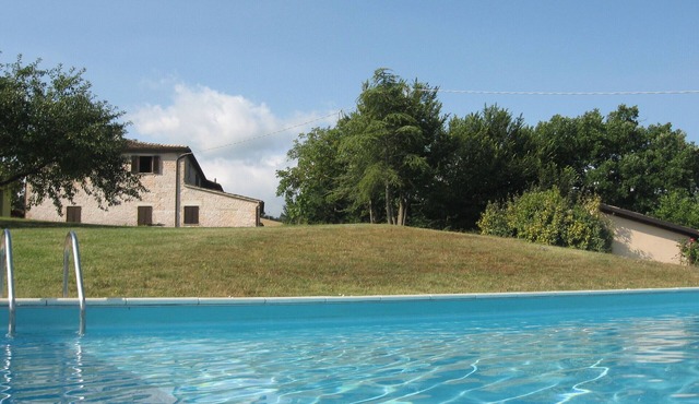 Three-room apartment in a farmhouse with swimming pool and home restaurant in Acqualagna