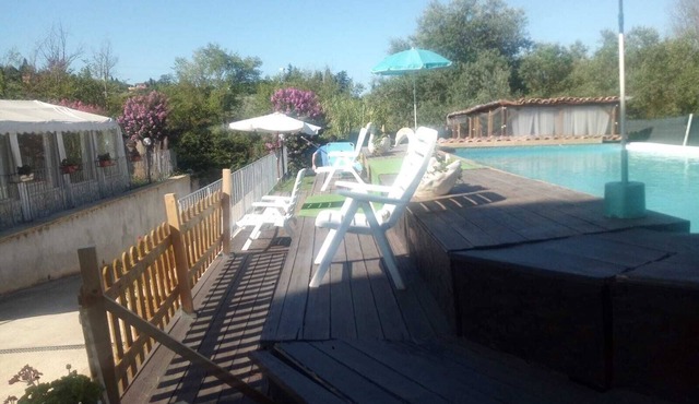 Villa Paradise Resort rents rooms surrounded by the greenery of its private Park