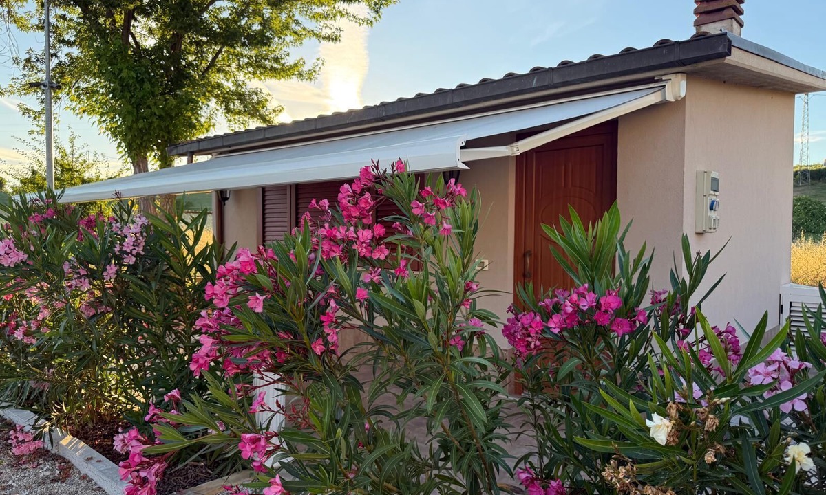 Roseto degli Abruzzi Cottage | A guesthouse with a fireplace in the garden of a villa with a pool; the beach is 5 minutes away