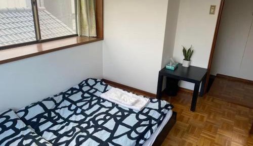 Queen Room with Shared Bathroom