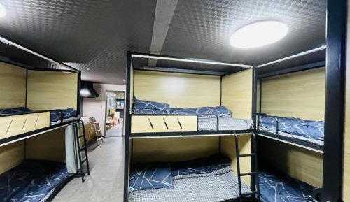 10-Bed Male Dormitory Room