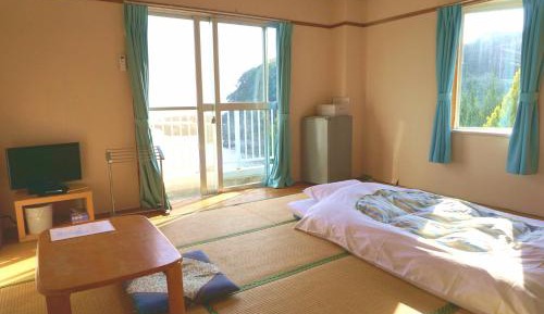 Quadruple Room with Shared Bathroom