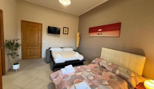 Quadruple Room with Private Bathroom