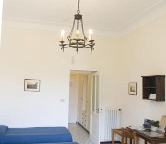 Superior Triple Room with Balcony and Garden View