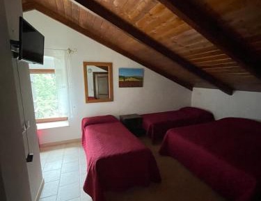 Quadruple Room with Private Bathroom