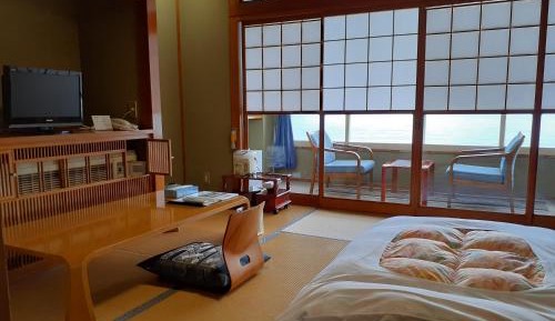 Quadruple Room with Shared Bathroom