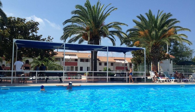 Holiday Apartment "Trilocale 34 Residence La Giungla" with Sea View, Shared Pool & Wi-Fi